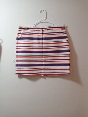 TOMMY HILFIGER  MINI SKIRT. NEW WITHOUT TAGS. SIZE 10. NAVY/RED